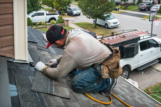 Professional Emergency Roof Repair technician working in Lincoln, RI